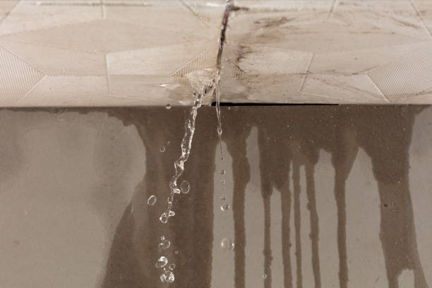 Professional Flood Damage Cleanup technician working in Bay Minette, AL